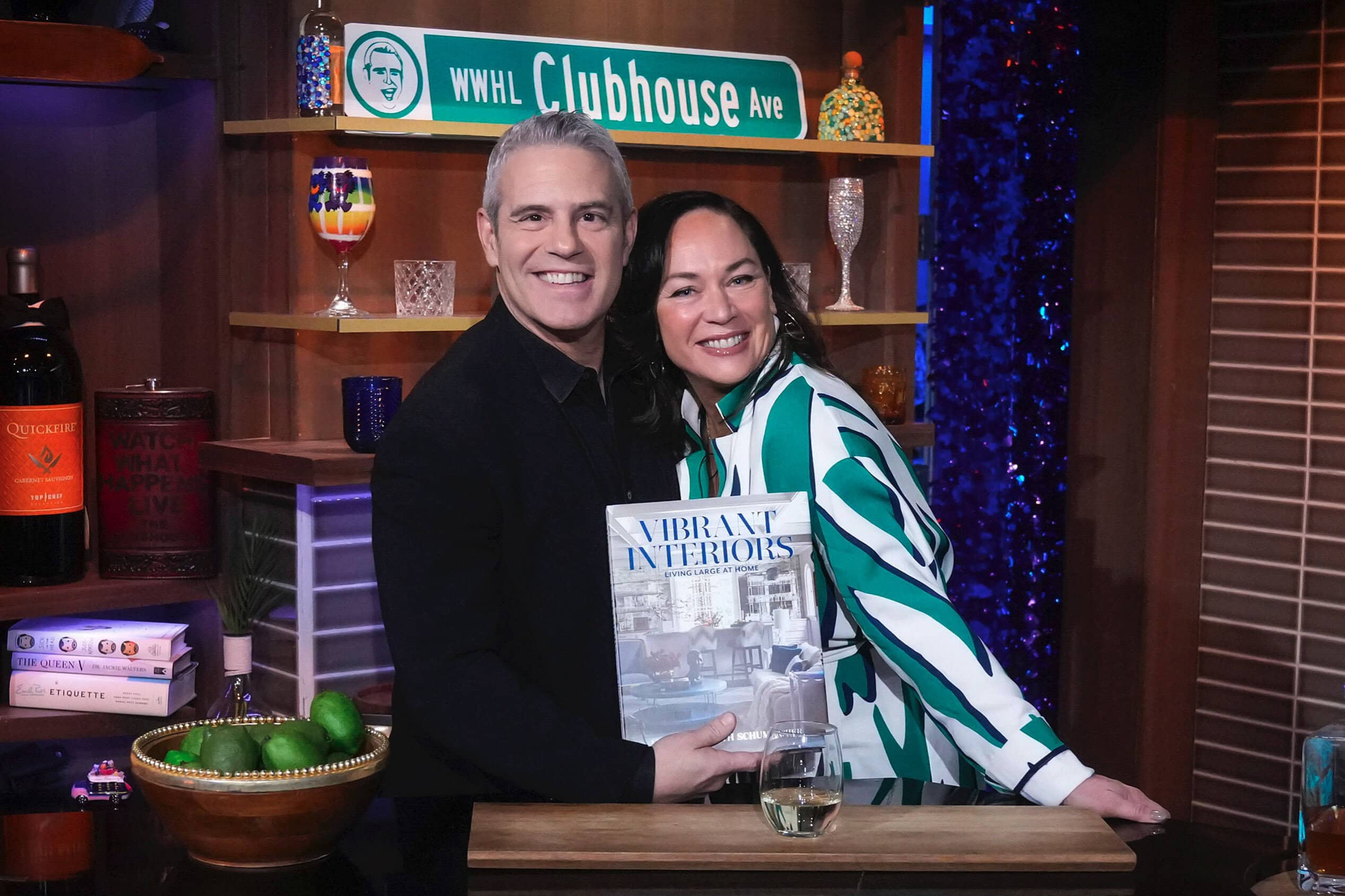Andy Cohen and Andrea Monath Schumacher on the set of Watch What Happens Live with Andy Cohen on Bravo TV.